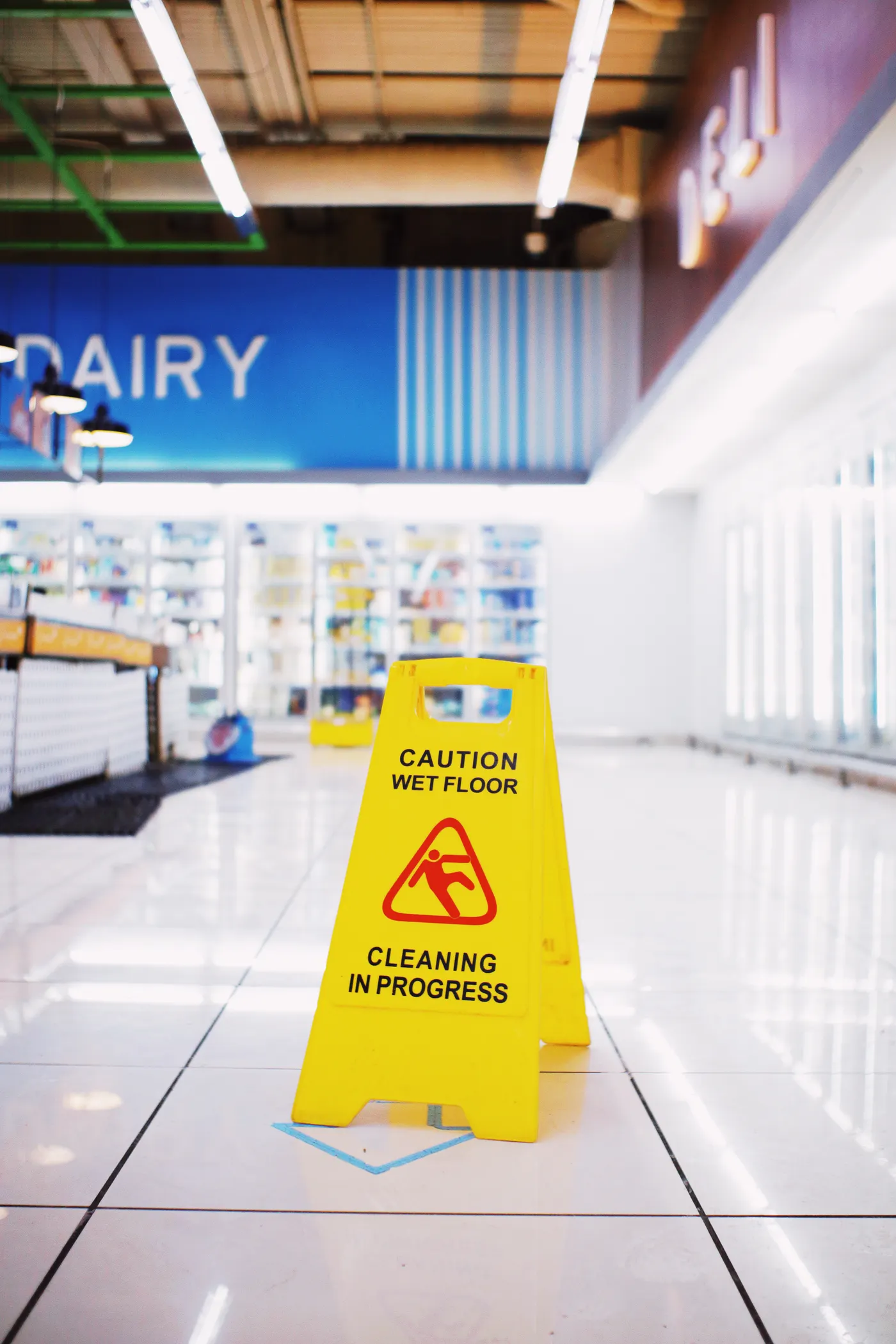 Wet-floor warning sign inside a commercial property