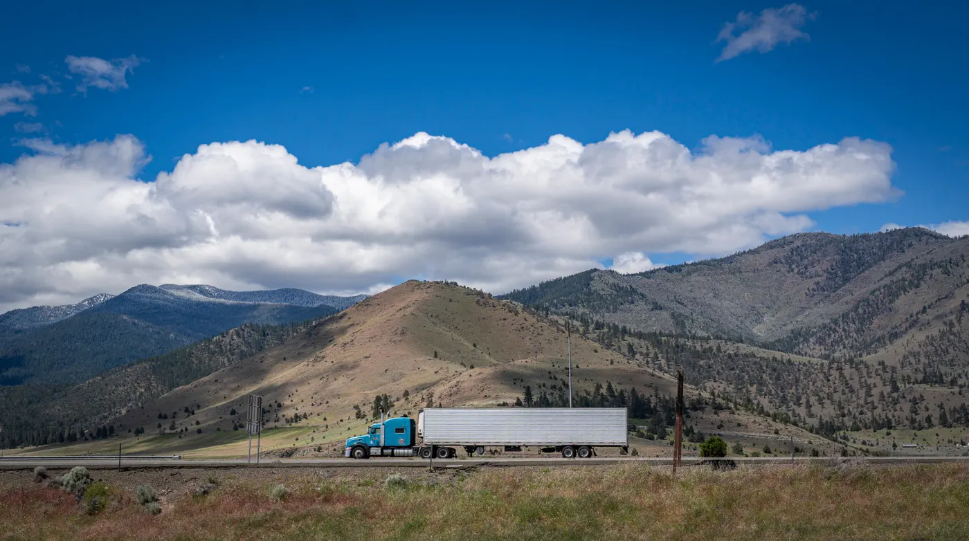 Commercial semi-truck traveling on a highway